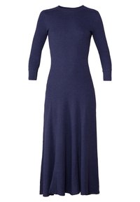 Robe longue à manches longues de couleur marine en matériau tricoté côtelé ; buste ajusté avec une jupe évasée, décolleté rond et manches effilées.