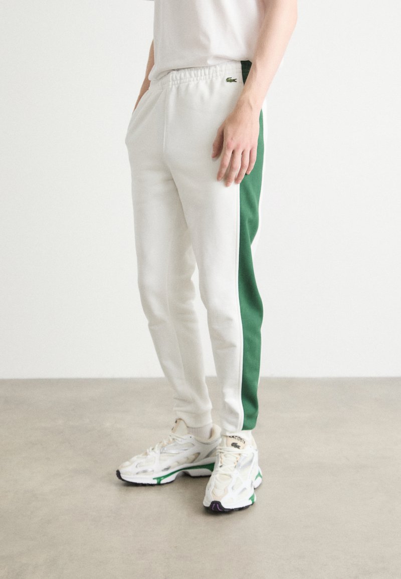Lacoste Treniņtērpa apakšdaļas - flour/green