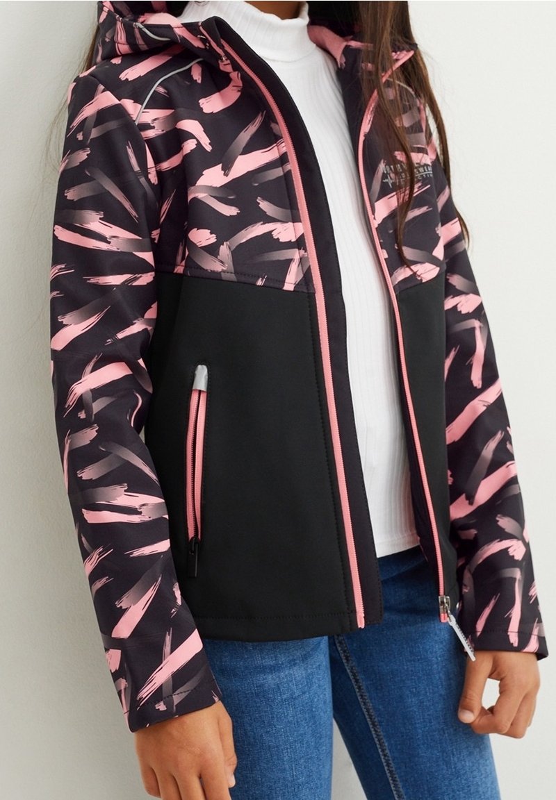 Black and pink jacket with abstract brushstroke pattern, zippered pockets, a hood, and a fitted design, made from smooth, synthetic material.