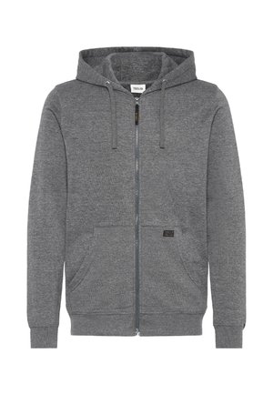 Grauer Reißverschluss-Hoodie aus weichem Material, mit Kapuze, Fronttaschen und einem kleinen Logo-Tag an der linken Tasche.