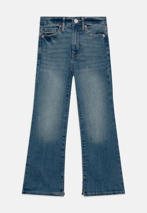 GIRLS - Platėjantys džinsai - medium wash