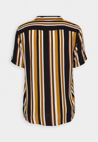 Camicia a maniche corte con righe verticali in nero, senape, bianco e marrone. Tessuto morbido con una vestibilità comoda e dettaglio della yoke sul retro.