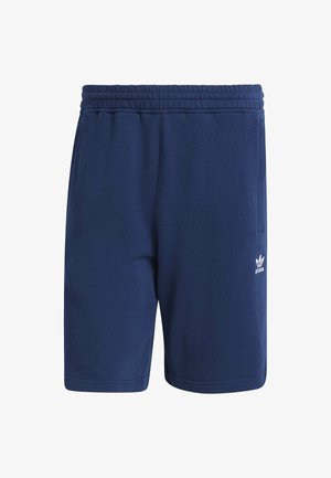 Navy blue athletic shorts made from soft, textured fabric with an elastic waistband and side pockets. Features a small white logo.