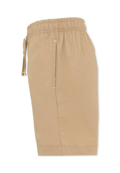 Shorts décontractés beige avec taille élastique et poches latérales, dotés d'un cordon de serrage sur le côté gauche.