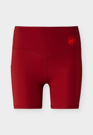 Shorts de cyclisme athlétiques rouges taille haute avec coutures plates et petit logo mammouth rouge sur la hanche gauche.