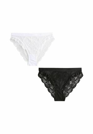 Kanten ondergoedset in wit en zwart. Bevat bloemenkant, geschulpte randen en een mesh-paneel in het midden voor extra textuur.