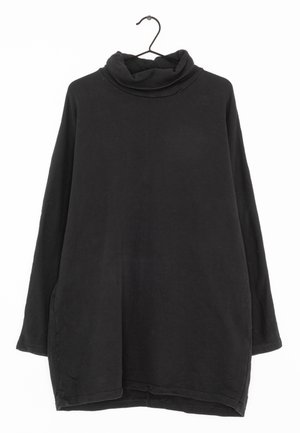Stickad tröja - black