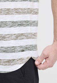 Short-sleeved, striped shirt with green and brown horizontal stripes on a white background. Features a rounded hem and small label at the side.