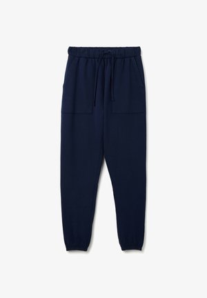 Pantaloni da jogging blu navy realizzati in tessuto morbido, dotati di vita elastica con cordino, due tasche anteriori e polsini elastici.