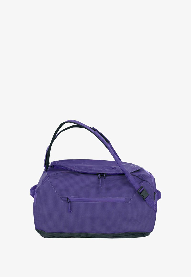 Borsa da viaggio viola con dettagli neri, dotata di scomparto principale con cerniera, tasca laterale e tracolla regolabile. Tessuto strutturato.