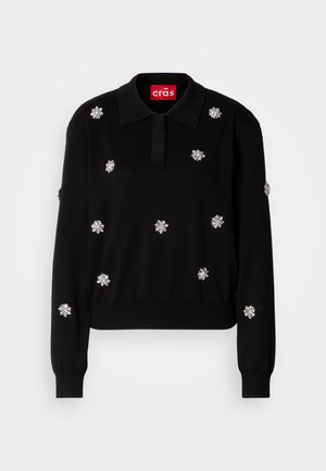 Black pullover sweater with a collared neckline, embellished with silver floral appliqués, featuring ribbed cuffs and hem.