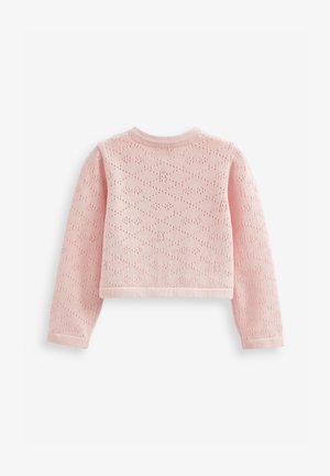 Pale rózsaszín, cropped kötött pulóver hosszú ujjakkal, kis lyukacskákból álló textúrájú mintázattal. Kerek nyakkivágással és bordás mandzsettákkal készül.