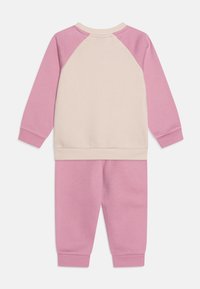 Puma MINICATS RAGLAN UNISEX SET - Pantaloni - mauved out