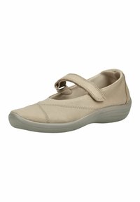 Chaussure beige style Mary Jane avec une bride Velcro, semelle souple et détails de couture, conçue pour un confort décontracté et une facilité de port.