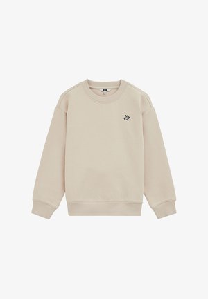 Sweat-shirt beige à manches longues avec col rond, motif texturé subtil et petit logo oiseau noir et blanc sur le côté gauche de la poitrine.