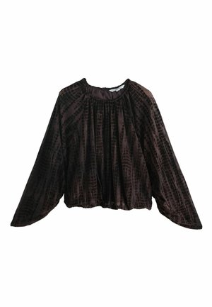 Blouse en velours marron foncé à manches longues avec encolure froncée et motif texturé subtil, coupe ample avec ourlet élastiqué à la taille.