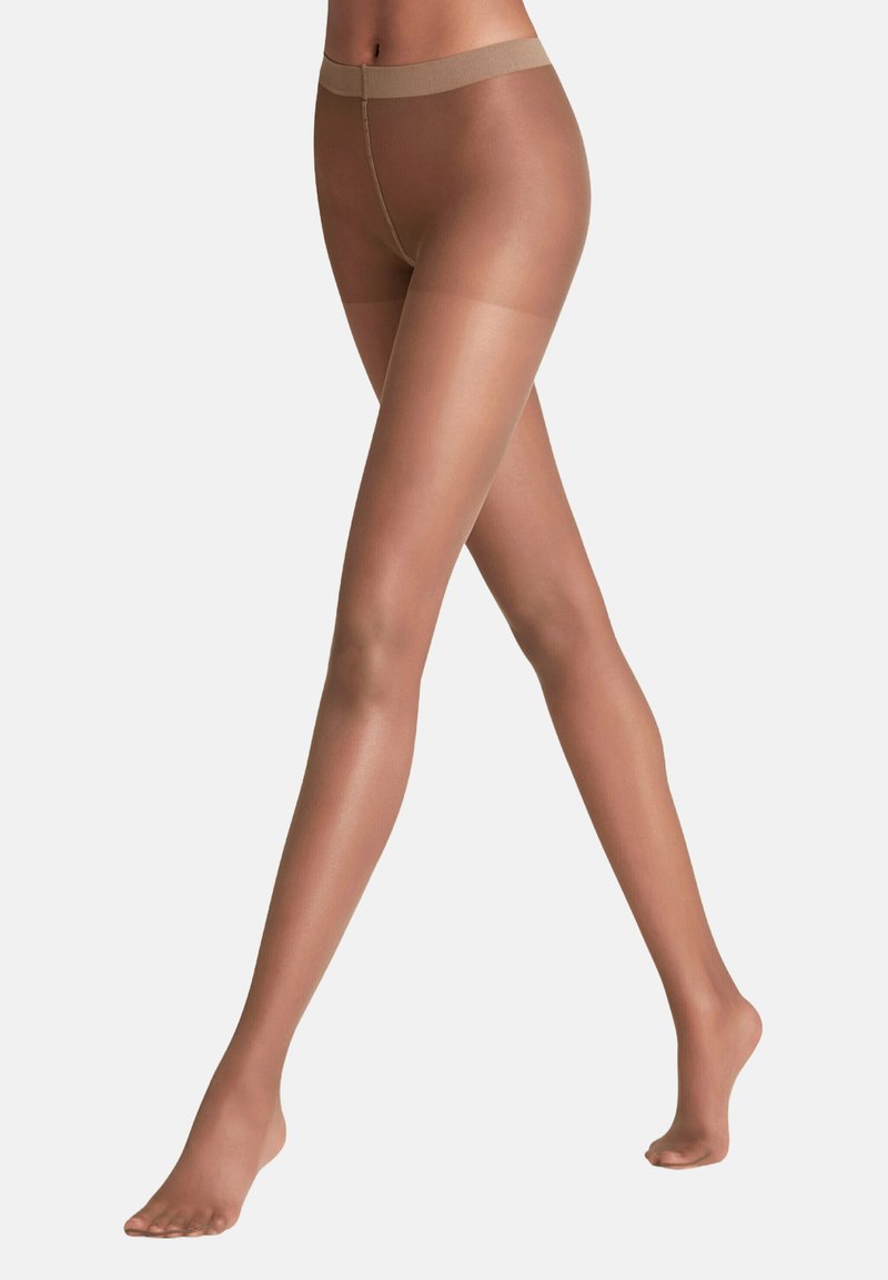 Helle hautfarbene Strumpfhose mit glatter Textur, halbtransparentem Design und einem weichen elastischen Bund, der ein natürliches Beinbild betont.