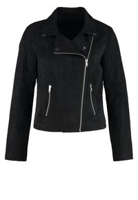 Veste en suédine noire avec une coupe ajustée, fermeture éclair asymétrique à l'avant et poches zippées. Présente des accents texturés sur les manches.