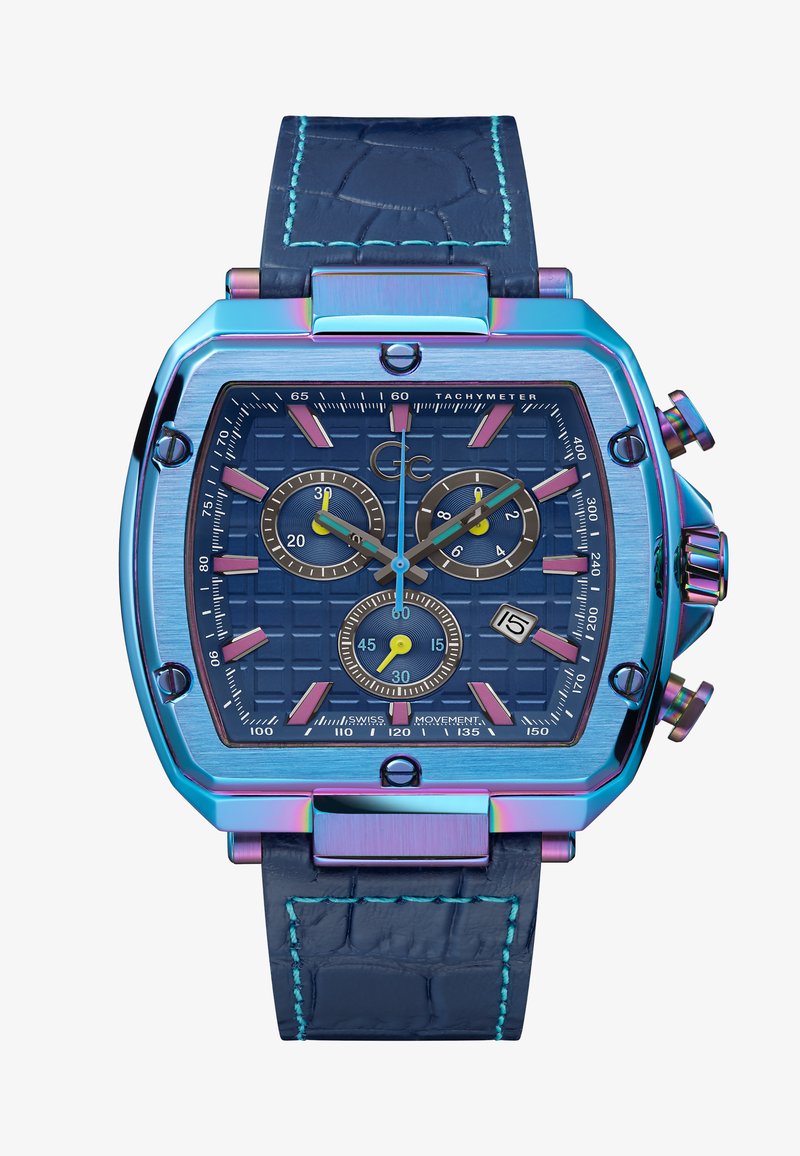 Kvadratinis laikrodis su mėlynu metaliniu korpusu ir tachimetru, tamsiai mėlynas tekstūruotas ciferblatas, trys subdailiai ir mėlyna odinė apyrankė su šviesiai mėlynomis siūlėmis.