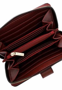 Red synthetic leather wallet with a zippered closure. Multiple card slots and a center zip pocket, featuring a gold-tone hardware accent.
