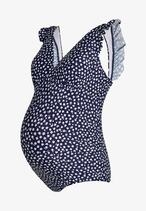 Costume da bagno premaman blu navy con motivo floreale bianco e spalline arricciate.