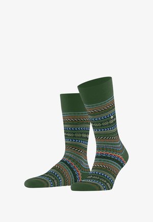 Calzini verdi a motivo con vari disegni geometrici in blu, rosso e arancione, con polsino a costine per elasticità e comfort.