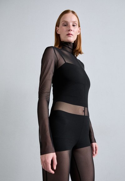 Black form-fitting bodysuit with sheer mesh long sleeves and torso, highlighting a smooth texture and modern design. Features a high neckline.