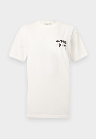 White short-sleeve t-shirt with "ANINE BING" text and small star accents printed on the left chest pocket area.