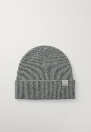 Gray knitted beanie with a ribbed texture, featuring a folded cuff and a small stitched logo patch on the front.