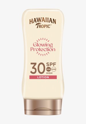 Hawaiian Tropic Glowing Protection SPF 30 Lotionflasche mit hohem UVA- und UVB-Schutz, beige und braune Verpackung.