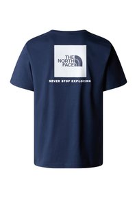 Námořnická modrá bavlněná tričko s bílým čtvercovým logem na zadní straně a textem "THE NORTH FACE" a "NEVER STOP EXPLORING" pod ním.