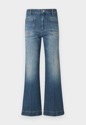 Gaiši zilas flared džinsi ar izbalējušu tekstūru. Iespējas piecas kabatas un pogu aizdare, ar redzamām šuvēm.