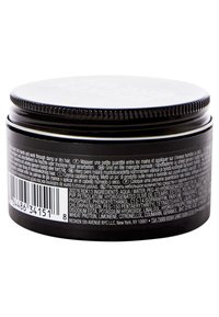 Bocal rond noir avec couvercle à vis, bord texturé et finition mate. Contient les détails du produit en blanc et un texte multilingue sur l'étiquette.