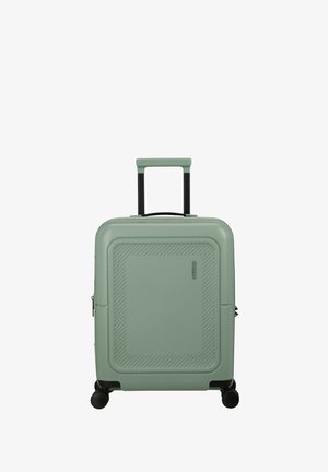 Hard-shell carry-on suitcase in light green. Features a textured surface with diagonal lines, black retractable handle, and 4 spinner wheels.