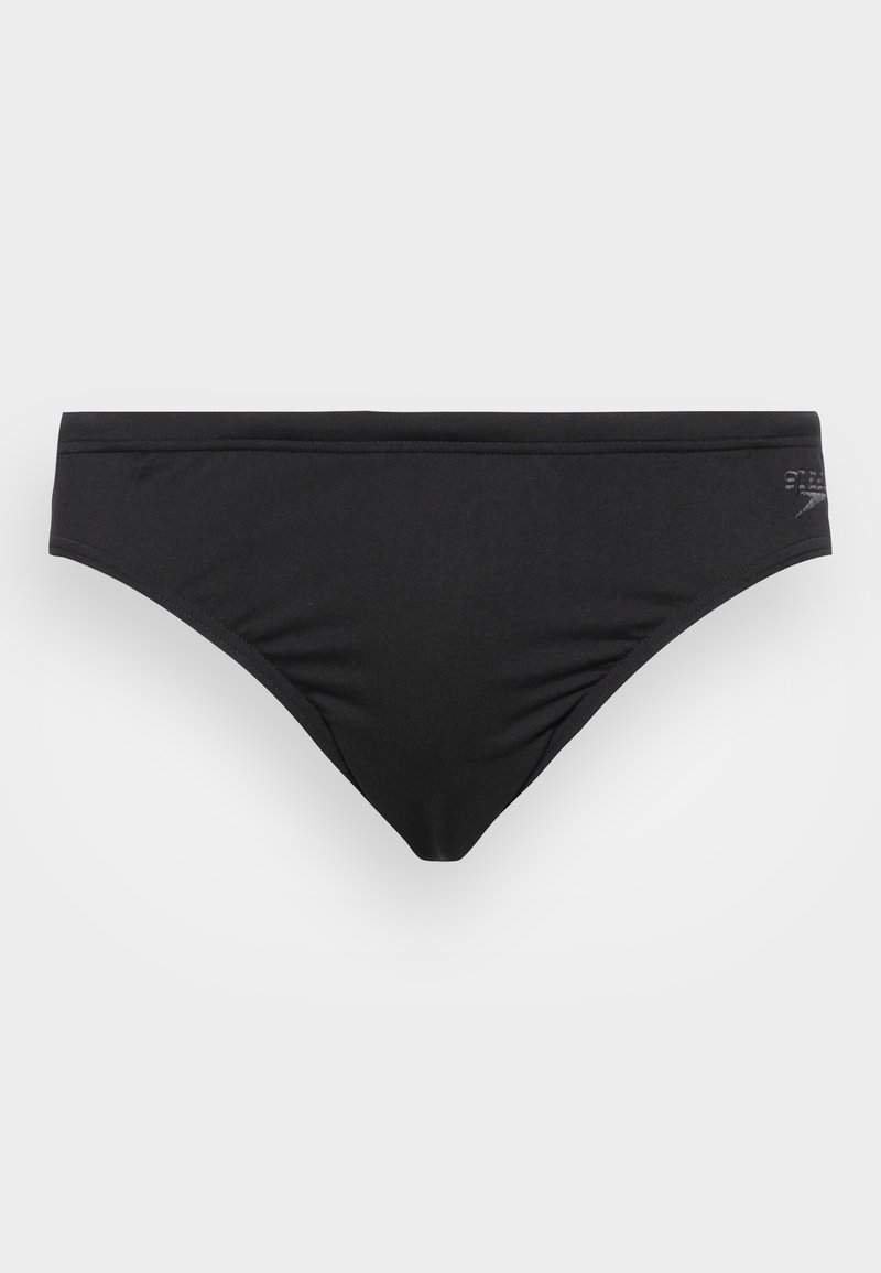 Bas de bikini noir en tissu lisse. Présente un design à taille basse avec une couverture minimale et un discret logo sur le côté.