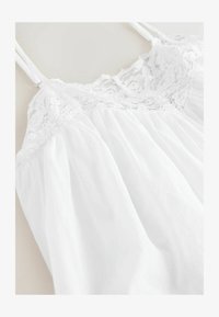 Non sélectionné, white