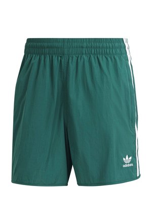 Shorts de sport Adidas verts avec taille élastique, bandes blanches sur les côtés et logo Adidas sur la partie inférieure de la jambe gauche.