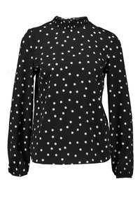 Blusa nera con maniche lunghe e pois bianchi, caratterizzata da un colletto a ruches e polsini elasticizzati, realizzata in tessuto morbido.