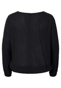 Blouse noire à manches longues froncées, col arrondi et couture dorsale droite. Fabriquée en tissu léger et texturé.