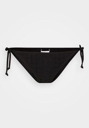 Black bikini bottom with a textured pattern, tie-side closures, and a rectangular silver accent at the front. Soft material.