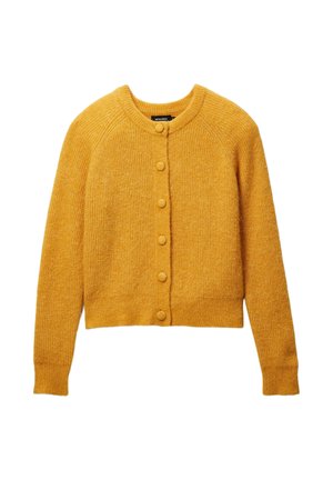 Cardigan jaune moutarde en maille douce. Présente un col rond, de longues manches raglan et une fermeture frontale à boutons ronds.