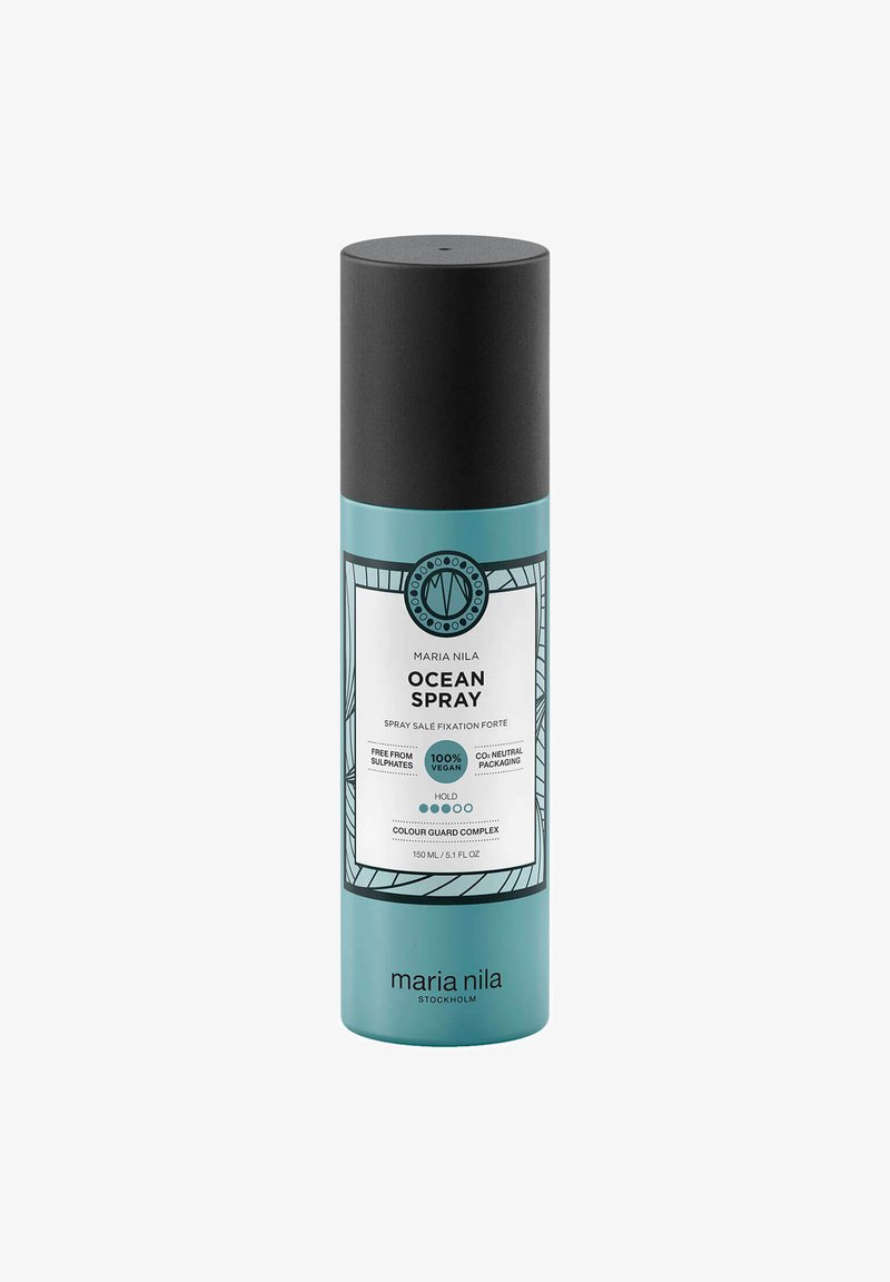 Haarstylingspray in een cilindervormige turquoise fles met een zwarte dop. Heeft een wit etiket met zwarte tekst en een geometrisch ontwerp. 150ml.