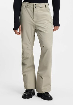 - Spodnie materiałowe