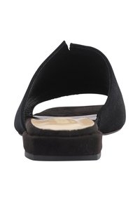 Sorte ruskind slip-on flade sandaler med åben bagdesign, tekstureret inderside og polstret sål for komfort.