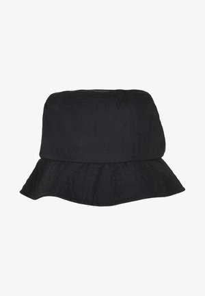 Must kann vastupidavast kangast. Omab laia, venivat äärt ja veidi tekstuurset pinda. Õmblusdetailid on nähtavad.