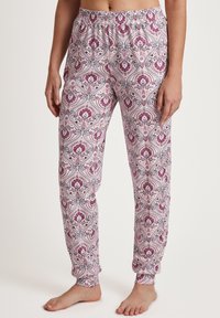 Leichte, gemusterte Schlafanzughosen in Weiß mit pinken und marineblauen Blumenmotiven, ausgestattet mit einem elastischen Bund und tapered Bündchen.