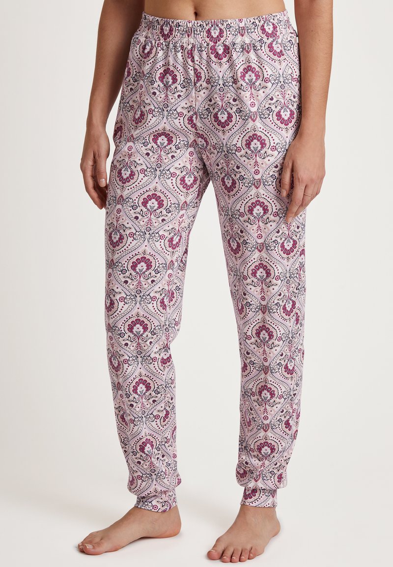Leichte, gemusterte Schlafanzughosen in Weiß mit pinken und marineblauen Blumenmotiven, ausgestattet mit einem elastischen Bund und tapered Bündchen.