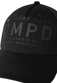 Black cap with a rounded peak, featuring embossed text "CMPD" and "CAMP DAVID" in matte black, red accent "19" at the front.