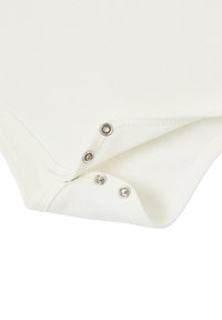 White cotton bodysuit corner featuring snap buttons. Smooth texture with a clean finish. Minimalist design, no patterns or embellishments.