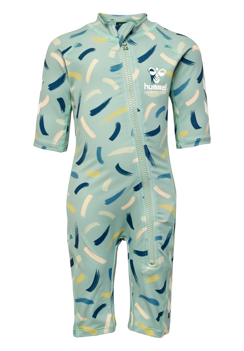 Kortärmad barnvåtdräkt i mintgrön med abstrakta penseldragsmönster i blått, krämfärgat och gult. Frontal dragkedjestängning.
